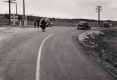 Three cars stopped on a road