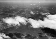Hills, towns and farmland in an aerial photograph
