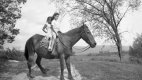 Two girls on a horse