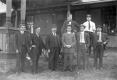 Eight Men in Front of Middlebury Railroad Station