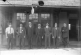 Seven Men in Front of Middlebury Railroad Station