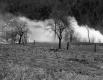 Wooden-frame building engulfed in flames