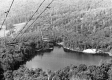 A chair lift running over a Pleid Lake