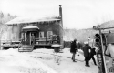Firemen in a snowy scene
