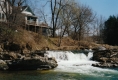 House above a waterfall