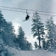 Skiers on Chairlift at Madonna Peak