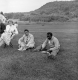 Foreign Students sitting in the grass
