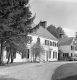 White, wooden-frame dwelling