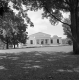Stone Building and deciduous trees