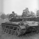 Army men on a tank