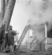 Firemen in a smoky scene