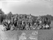 A group of men, some with musical instruments