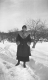 Woman Standing Amongst the Snow