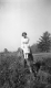 Woman Sitting on Stump