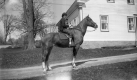 Woman Riding Horse