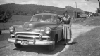 Young Woman with Car