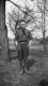 Young Boy Standing in Field