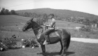 Boy Riding Horse