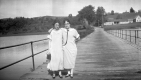 Two Women on floating bridge