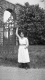 Woman Near Stone Archway