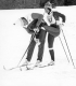 Two People Skiing