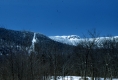 Snow Covered Mountain and a ski Trail