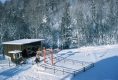 Chair Lift on a Snowy Mountain 