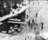 View of men cutting ice