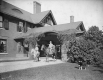 Vanderbilt Webb in front of his house