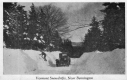 Car on snow covered road