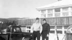 Two Men in front of Building