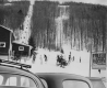 View of T-Bar Building and Automobiles