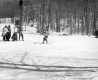 Spectators Watch Ski Racer