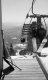 Snowboarders Disembark from Lift