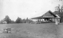 Wooden-frame building with large porch