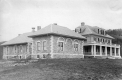 Stone and wooden-frame building