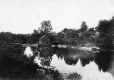 Wooden-frame building at the edge of water