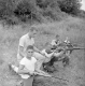 Boys Learning to Shoot Guns