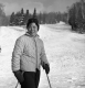 Woman Poses on Ski Slope