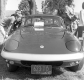 Young boys admiring a car
