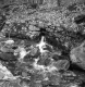 Water flowing out of a culvert