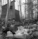 Water rushing over a small dam