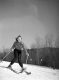 Woman Skiing Down a Mountain
