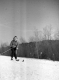 Woman Skiing Down a Mountain