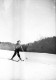 Woman Skiing Down a Mountain