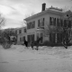 George Hawks with Horse in Front of Home
