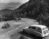 Station Wagon Driving Down the Mountain