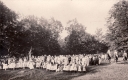 A Crowd of People with a Flag