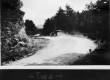 Car on a dusty dirt road