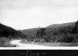 Car on winding dirt road